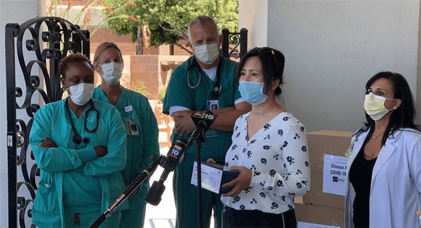member of Chinese American coronavirus recovery group donates medical masks