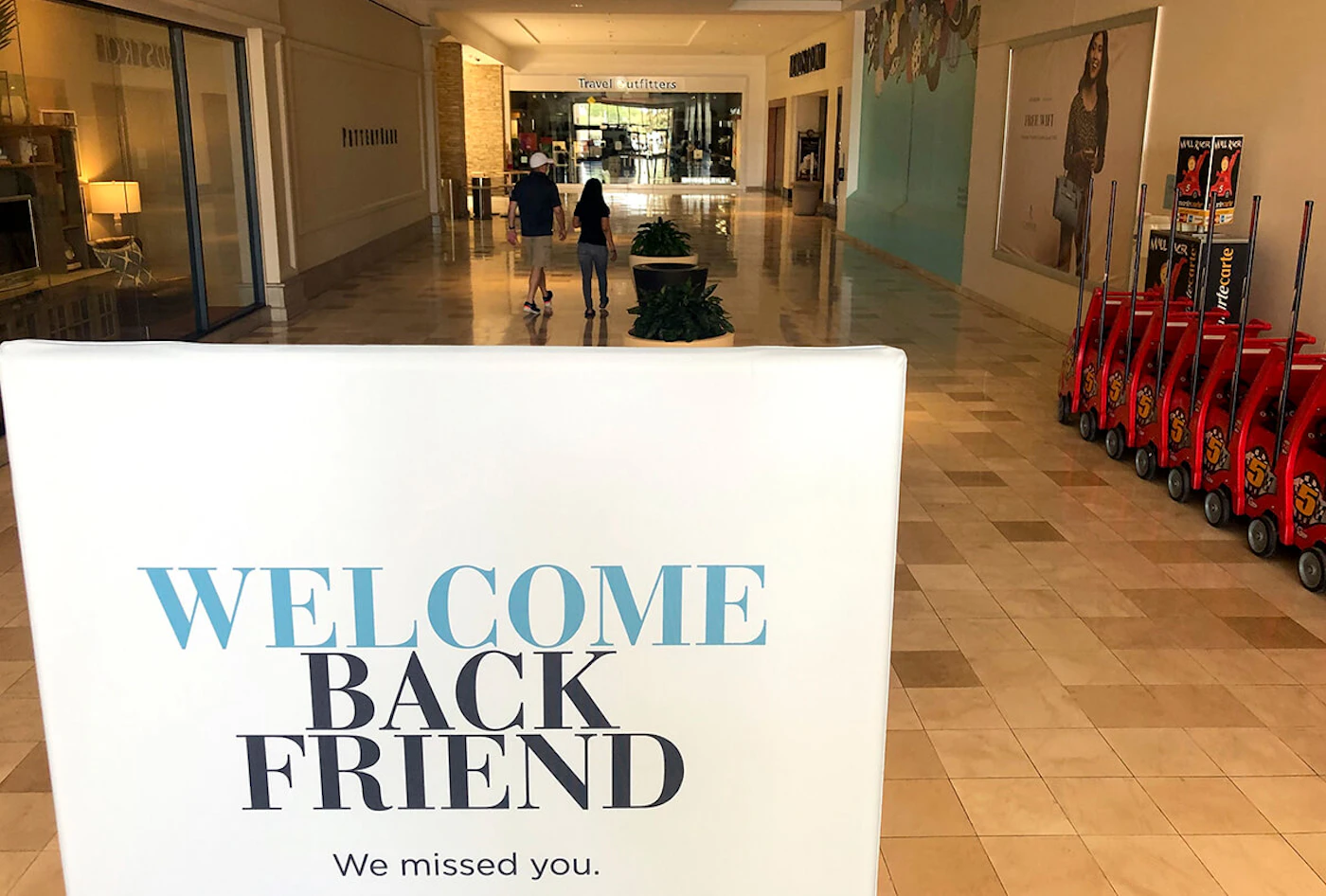 sign saying "welcome back friend" in Chandler mall