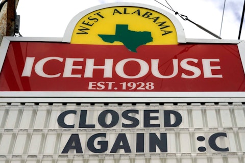 A sign outside the West Alabama Icehouse shows the bar is closed Monday, June 29, 2020, in Houston. Texas Gov. Greg Abbott shut down bars again and scaled back restaurant dining on Friday as cases climbed to record levels after the state embarked on one of America's fastest reopenings. (AP Photo/David J. Phillip)