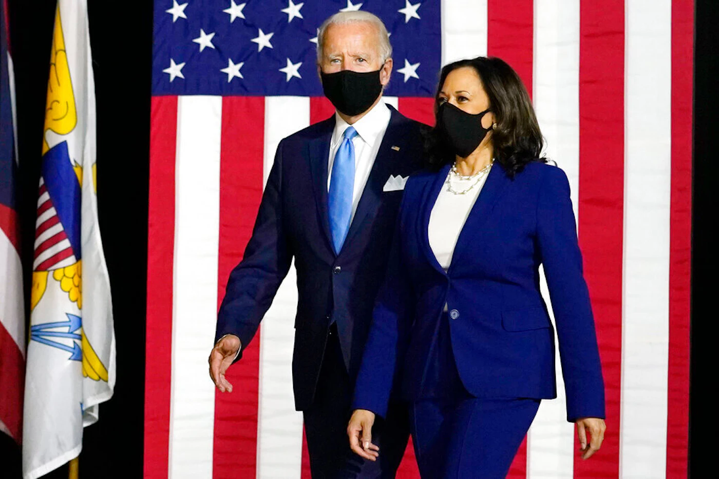 Semocratic presidential candidate former Vice President Joe Biden and his running mate Sen. Kamala Harris, D-Calif., arrive to speak at a news conference at Alexis Dupont High School in Wilmington, Del. (AP Photo/Carolyn Kaster)