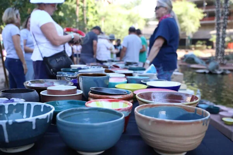 Waste Not, a Scottsdale nonprofit, hosts its 32nd annual Empty Bowl event, where patrons can purchase handcrafted bowls to help eliminate food insecurity in Arizona. Photo taken at the Arizona Center in downtown Phoenix on Oct. 14, 2022. (Photo by Scianna Garcia/ Cronkite News)