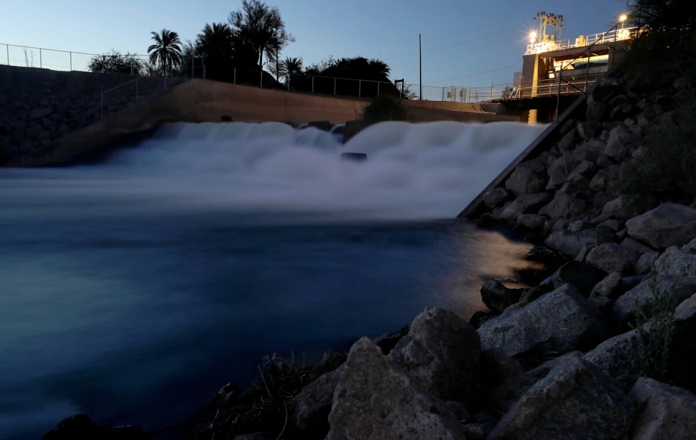 YUMA, ARIZONA - MAY 16, 2022. Colorado River water churns through the weir of the Laguna Diversion Dam near Yuma. The dam was the first to be built on the Colorado River and ended boat travel on the river. It now primarily serves to regulate outflows of the Imperial Dam. (Luis Sinco / Los Angeles Times via Getty Images)