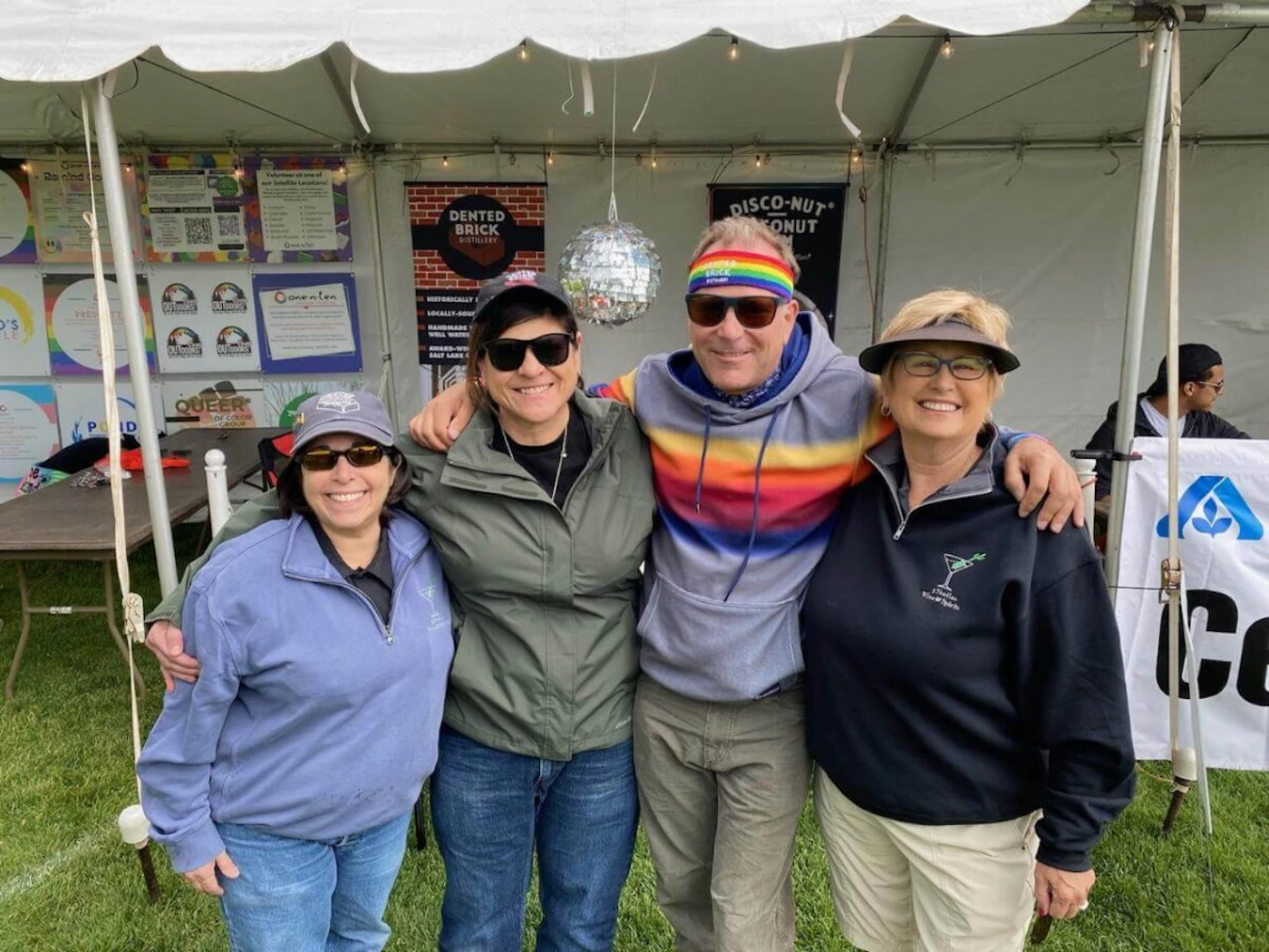 From left: Nancy Mangone, Joanne Spencer, Marc Christenson from Dented Brick Distillery, and 3 Sheilas Brand Ambassador Jane Crafter at the 2022 Pride in the Pines in Flagstaff. (Photo courtesy of Nancy Mangone)
