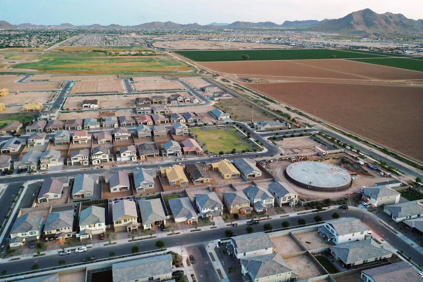 QUEEN CREEK, ARIZONA - JUNE 09: An aerial view of new home construction at a housing development in the Phoenix suburbs on June 9, 2023 in Queen Creek, Arizona. Queen Creek is one of the fastest growing communities in Arizona and is heavily reliant on groundwater for its water supply. Arizona Governor Katie Hobbs announced last week that Arizona will no longer be able to give developers new permits for home construction in some outlying areas of Maricopa County which rely on groundwater wells, due to a groundwater shortage amid a warming climate. Queen Creek is already spending around $24 million in total to purchase 2,000 acre-feet of Colorado River water entitlement per year from the GSC Farm located nearly 200 miles to the west in Cibola, Arizona. (Photo by Mario Tama/Getty Images)