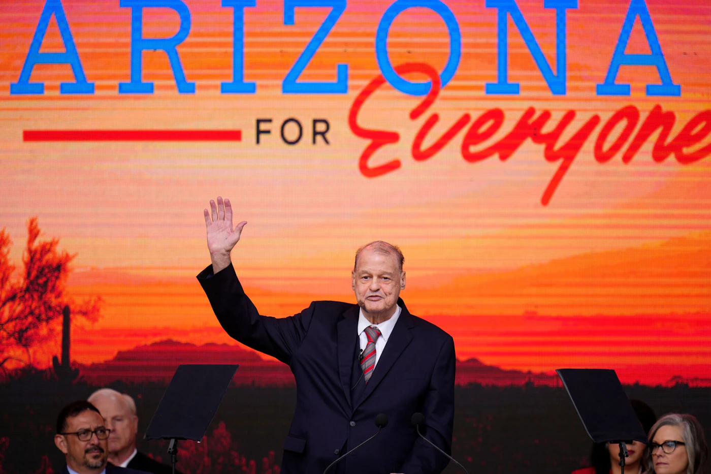 New Arizona State Superintendent of Public Instruction Tom Horne, a Republican, waves to the crowd after speaking and taking the ceremonial oath of office in a public ceremony at the state Capitol in Phoenix, Thursday, Jan. 5, 2023. (AP Photo/Ross D. Franklin)