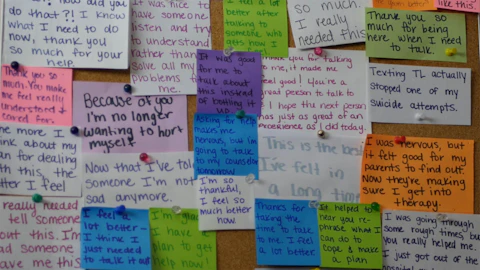 Counselors receive messages from teenagers who have called to express their gratitude. Teen Lifeline keeps the messages and hangs them in their hotline room. (Photo courtesy of Teen Lifeline)