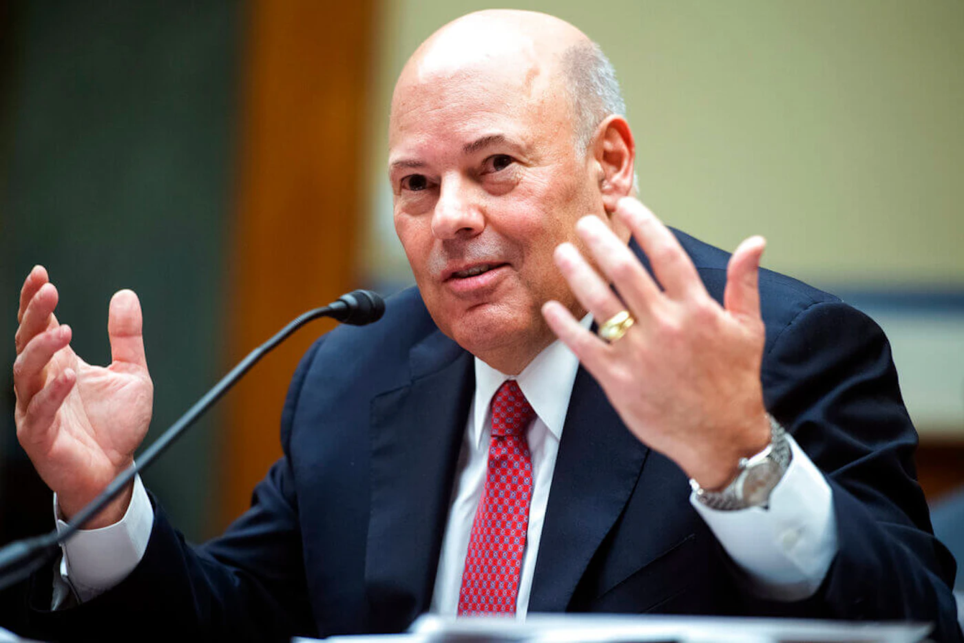In this Aug. 24, 2020, file photo, Postmaster General Louis DeJoy testifies during a House Oversight and Reform Committee hearing on the Postal Service on Capitol Hill in Washington. President Donald Trump says he's open to an investigation of DeJoy after some of DeJoy's former employees said they felt pressured to donate to GOP candidates. (Tom Williams/Pool via AP)