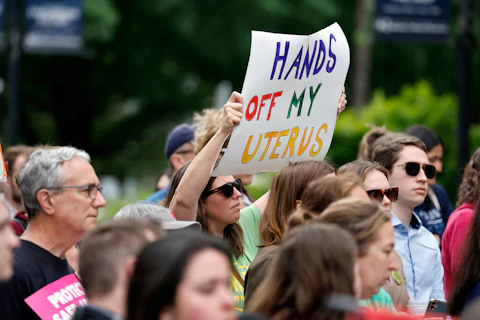 Abortion rights supporters gather at a rally at Bicentennial Plaza put on by Planned Parenthood South Atlantic in response to a bill before the North Carolina Legislature, Wednesday, May 3, 2023, in Raleigh, N.C. (AP Photo/Karl B DeBlaker)