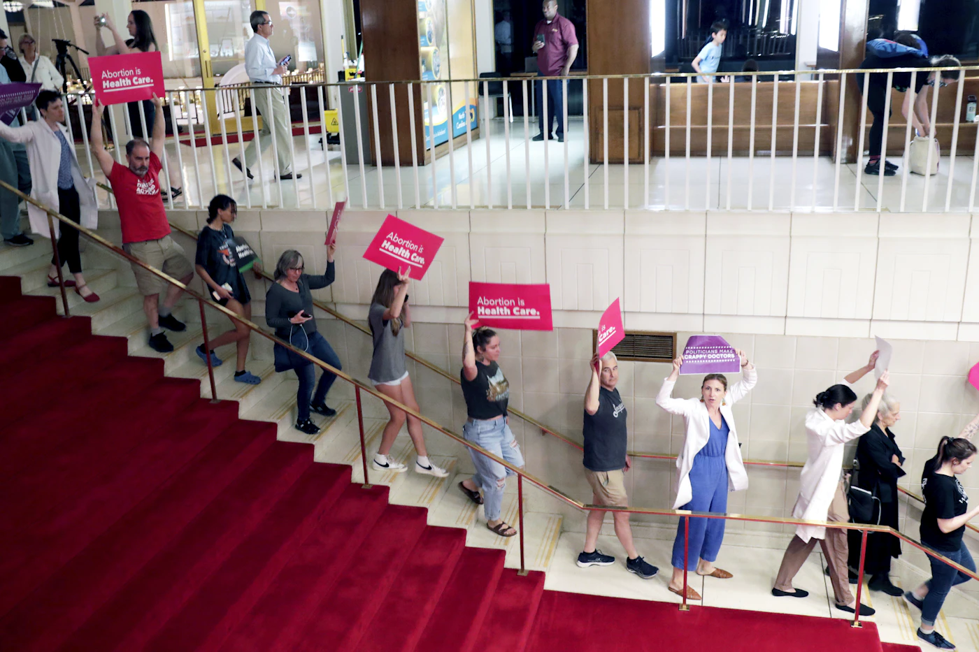 Abortion rights protesters were removed from the House gallery for shouting at lawmakers after they overrode Gov. Roy Cooper's veto of the abortion bill on Tuesday, May 16. (AP Photo/Chris Seward)