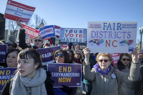 Protesters attend a 2019 anti-gerrymandering rally   in Washington, DC. (Photo by Tasos Katopodis/Getty Images)