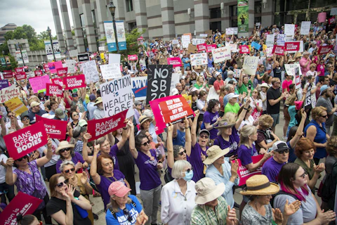 Hundreds of reproductive-freedom demonstrators gathered for a rally in Raleigh on May 19 to   watch North Carolina Gov. Roy Cooper veto the 12-week abortion ban. The legislature overrode the veto the following week. (Travis Long/The News & Observer via AP, File)