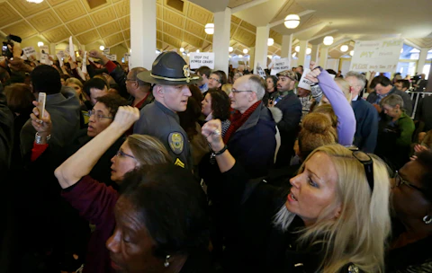 Demonstrators crowd the rotunda outside the House and Senate galleries during a special session at the North Carolina Legislature in Raleigh, N.C., Thursday, Dec. 15, 2016. (AP Photo/Gerry Broome)