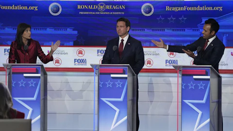 Former U.N. Ambassador Nikki Haley, left, argues a point with businessman Vivek Ramaswamy, right, between Florida Gov. Ron DeSantis, center, during a Republican presidential primary debate hosted by FOX Business Network and Univision, Wednesday, Sept. 27, 2023, at the Ronald Reagan Presidential Library in Simi Valley, Calif. (AP Photo/Mark J. Terrill)