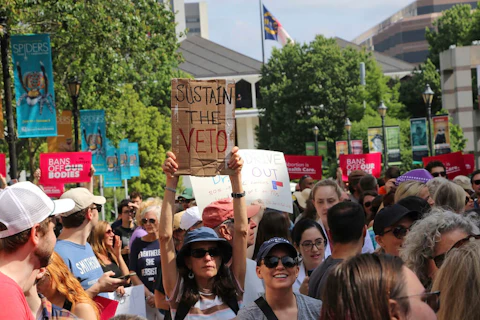 Hundreds of abortion-rights supporters ralied outside the North Carolina Legislative Building in Raleigh, N.C, on May 13 to urge Republican legislators to sustain Democratic Gov. Roy Cooper's veto of new abortion restrictions. (AP Photo/Hannah Schoenbaum)