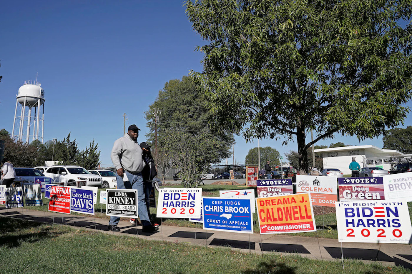 Voters at the Graham Civic Center polling site in Graham, N.C., Tuesday, Nov. 3, 2020. (AP Photo/Gerry Broome)