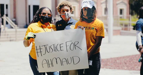 Women protesting Ahmaud's death