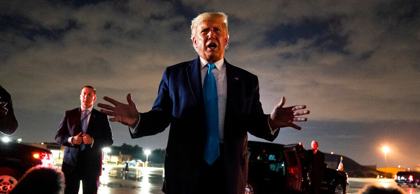 President Donald Trump talks with reporters at Andrews Air Force Base after attending a campaign rally in Latrobe, Pa., Thursday, Sept. 3, 2020, at Andrews Air Force Base, Md. trump-military-losers
