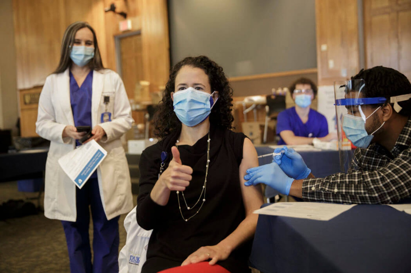Dr. Gabriela Maradiaga Panayotti gets a Pfizer COVID-19 vaccine at Duke University Hospital in Durham on Monday, Dec. 15, 2020. latinos-doctors-vaccine
