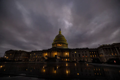 WASHINGTON, DC - DECEMBER 20: Dusk falls over the US Capitol building on December 20, 2020 in Washington, DC. Republicans and Democrats in the Senate finally came to an agreement on the coronavirus relief bill and a vote is expected later today or tomorrow. (Photo by Samuel Corum/Getty Images)