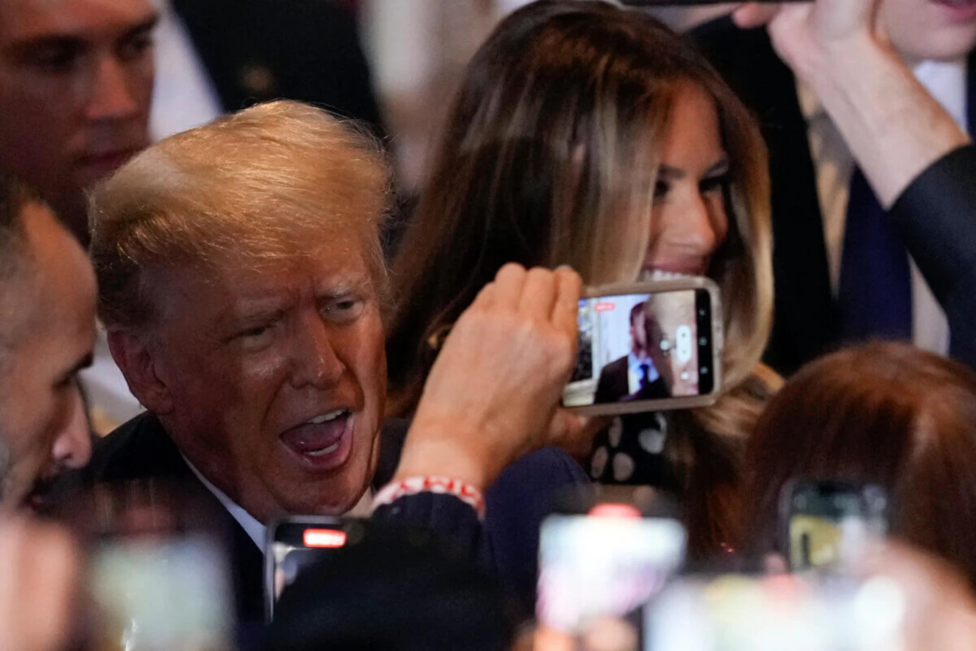 Election 2024 Trump Former President Donald Trump greets supporters after announcing a third run for president at Mar-a-Lago in Palm Beach, Fla., Tuesday, Nov. 15, 2022. Former first lady Melania Trump is at right. (AP Photo/Rebecca Blackwell)