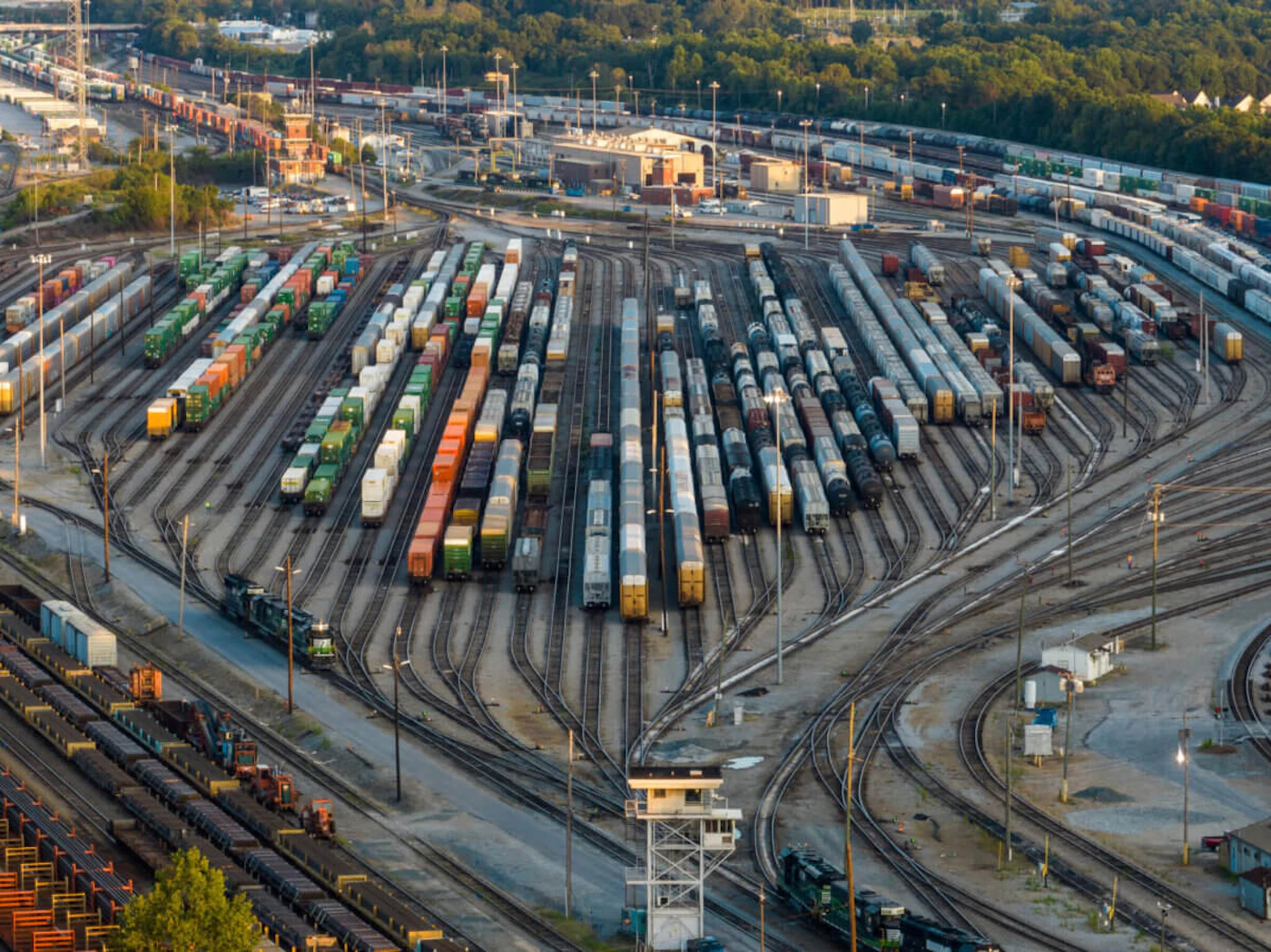 FILE - Freight train cars sit in a Norfolk Southern rail yard on Sept. 14, 2022, in Atlanta. The Biden administration is saying the U.S. economy would face a severe economic shock if senators don't pass legislation this week to avert a rail worker strike. The administration is delivering that message personally to Democratic senators in a closed-door session Thursday, Dec. 1. (AP Photo/Danny Karnik, File)