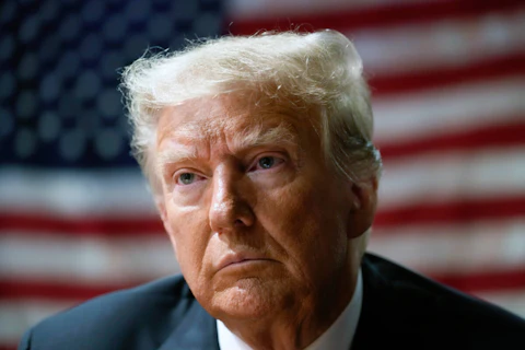 FILE - Former President Donald Trump attends an event with supporters at the Westside Conservative Breakfast, in Des Moines, Iowa, Thursday, June 1, 2023. Trump described a Pentagon “plan of attack” and shared a classified map related to a military operation, according to an indictment unsealed Friday, June 9. The document marks the Justice Department’s first official confirmation of a criminal case against Trump arising from the retention of hundreds of documents at his Florida home, Mar-a-Lago.  (AP Photo/Charlie Neibergall, File)