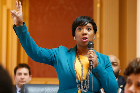 Del. Lashrecse Aird, D-Petersburg, gestures as she delivers a speech on redistricting during the House session at the Capitol, Thursday, March 5, 2020, in Richmond, Va. (AP Photo/Steve Helber)