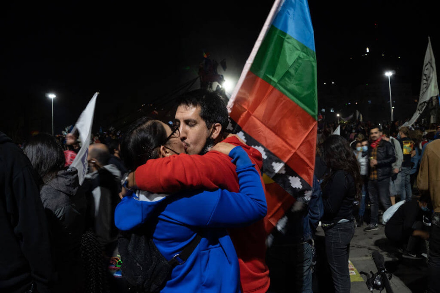 People celebrate the approval of a new constitution in Plaza Italia, an iconic place for protests and celebrations in Santiago, Chile on Oct. 25, 2020. chileans-celebrate-new-constitution