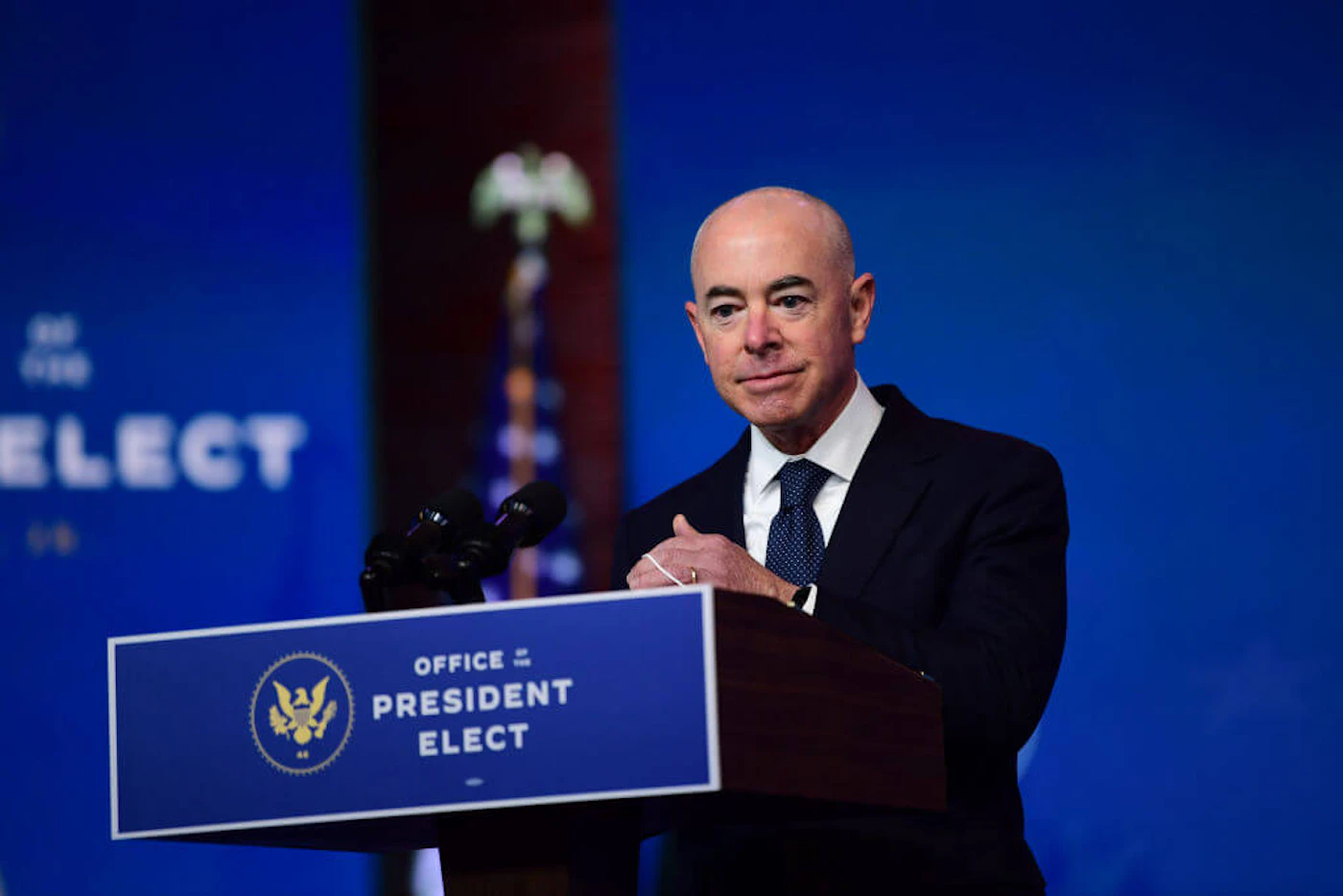 Secretary of Homeland Security nominee Alejandro Mayorkas removes his face mask to speak after being introduced by President-elect Joe Biden as he introduces key foreign policy and national security nominees and appointments at the Queen Theatre on November 24, 2020 in Wilmington, Delaware. Alejandro Mayorkas