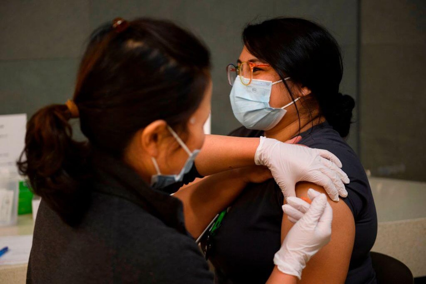 Healthcare workers receive COVID-19 vaccinations at Martin Luther King Jr. (MLK) Community Hospital on Jan. 6, 2021, in the Willowbrook neighborhood of Los Angeles, California. latino-vaccine-disinformation