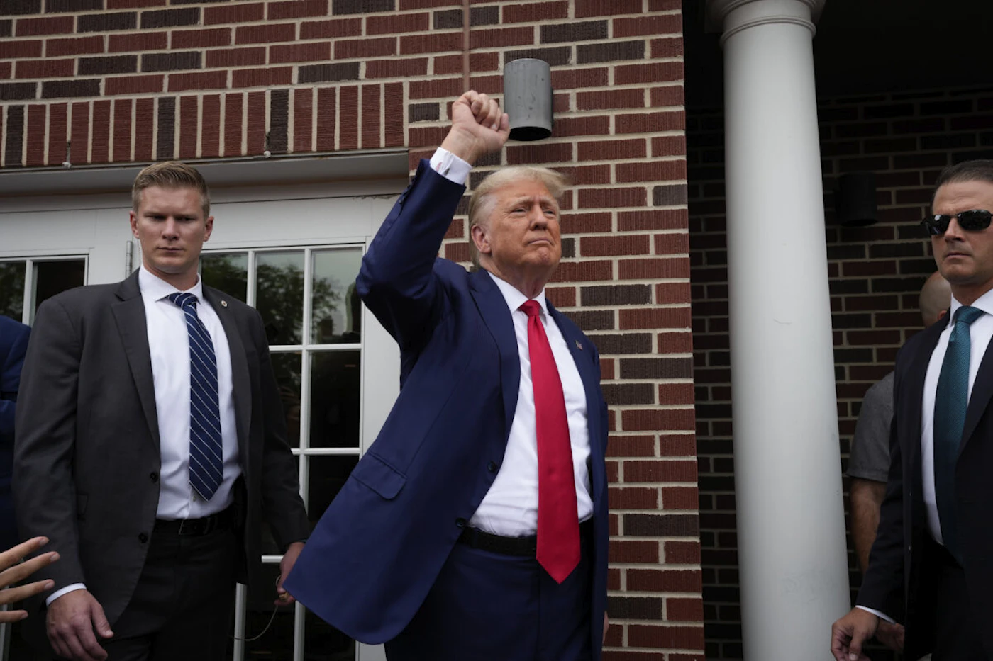 Former President Donald Trump visits the Alpha Gamma Rho, agricultural fraternity, at Iowa State University before an NCAA college football game between Iowa State and Iowa, Saturday, Sept. 9, 2023, in Ames, Iowa. (AP Photo/Charlie Neibergall)
