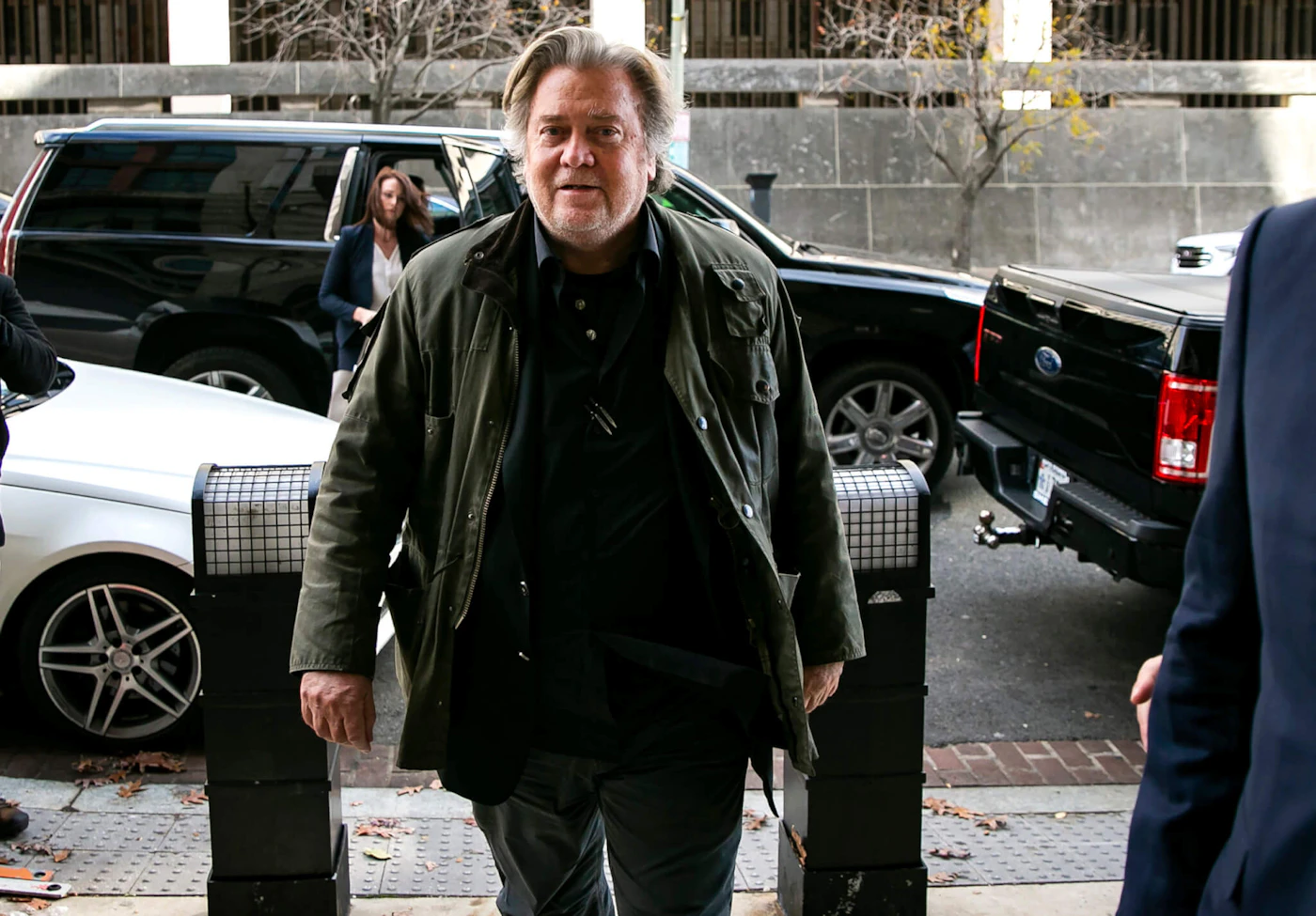 FILE - In this Nov. 8, 2019 file photo, former White House strategist Steve Bannon arrives to testify at the trial of Roger Stone, at federal court in Washington. Bannon was arrested Thursday, Aug. 20, 2020, on charges that he and three others ripped off donors to an online fundraising scheme “We Build The Wall.” The charges were contained in an indictment unsealed in Manhattan federal court.  (AP Photo/Al Drago, File)
