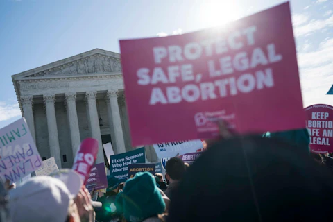 An abortion rights rally outside of the Supreme Court in March 2020 in Washington, DC. (Photo by Sarah Silbiger/Getty Images)