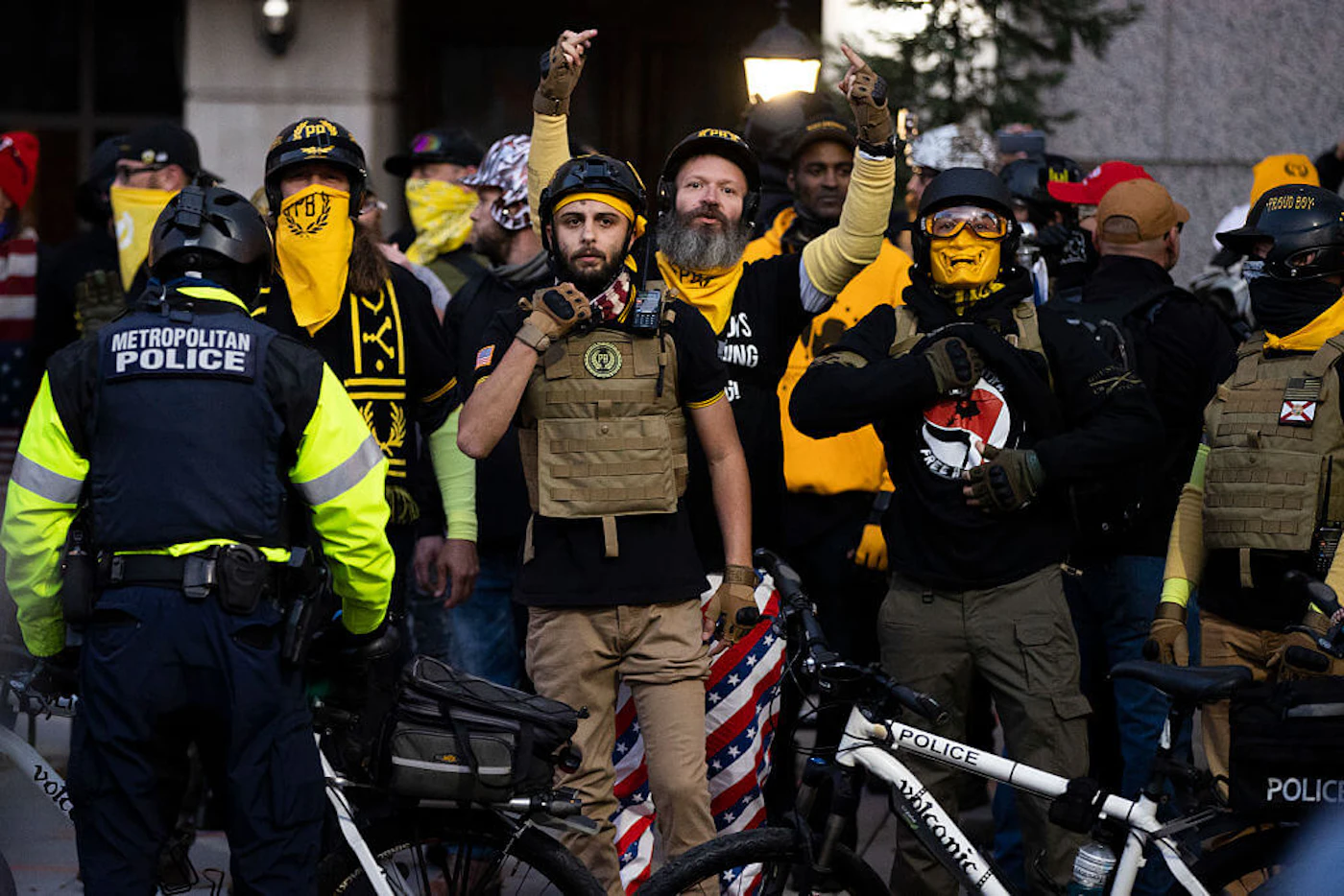 Members of the Proud Boys and Antifa stand off near Black Lives Matter Plaza on December 12, 2020 in Washington, DC. Thousands of protesters who refuse to accept that President-elect Joe Biden won the election are rallying ahead of the electoral college vote to make Trump's 306-to-232 loss official. (Photo by Tasos Katopodis/Getty Images)