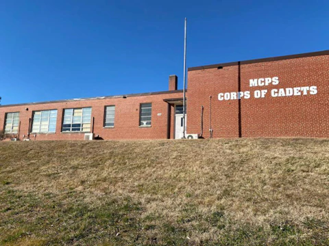 The former Friends Elementary School, an African American primary school located on the hill overlooking the CI farm campus. The building is now used by the Montgomery County Public Schools Corps of Cadets. Photo by Ashley Spinks Dugan.