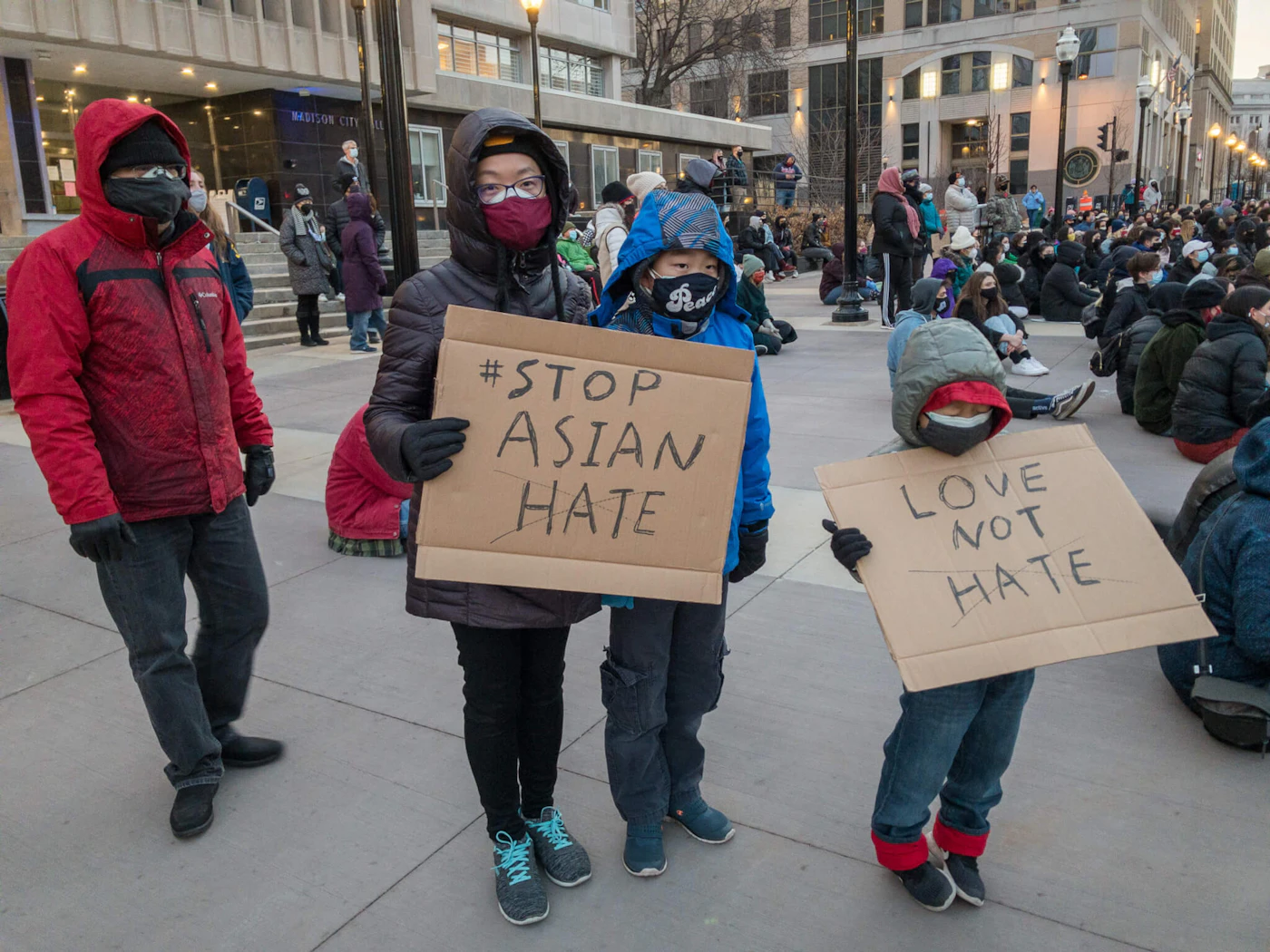 This family was among about 200 people who attended a march Thursday evening in Madison to support of the Asian American and Pacific Islander community in the wake of a shooting spree in Georgia that left eight dead, including six Asian women. (Photo by Christina Lieffring)