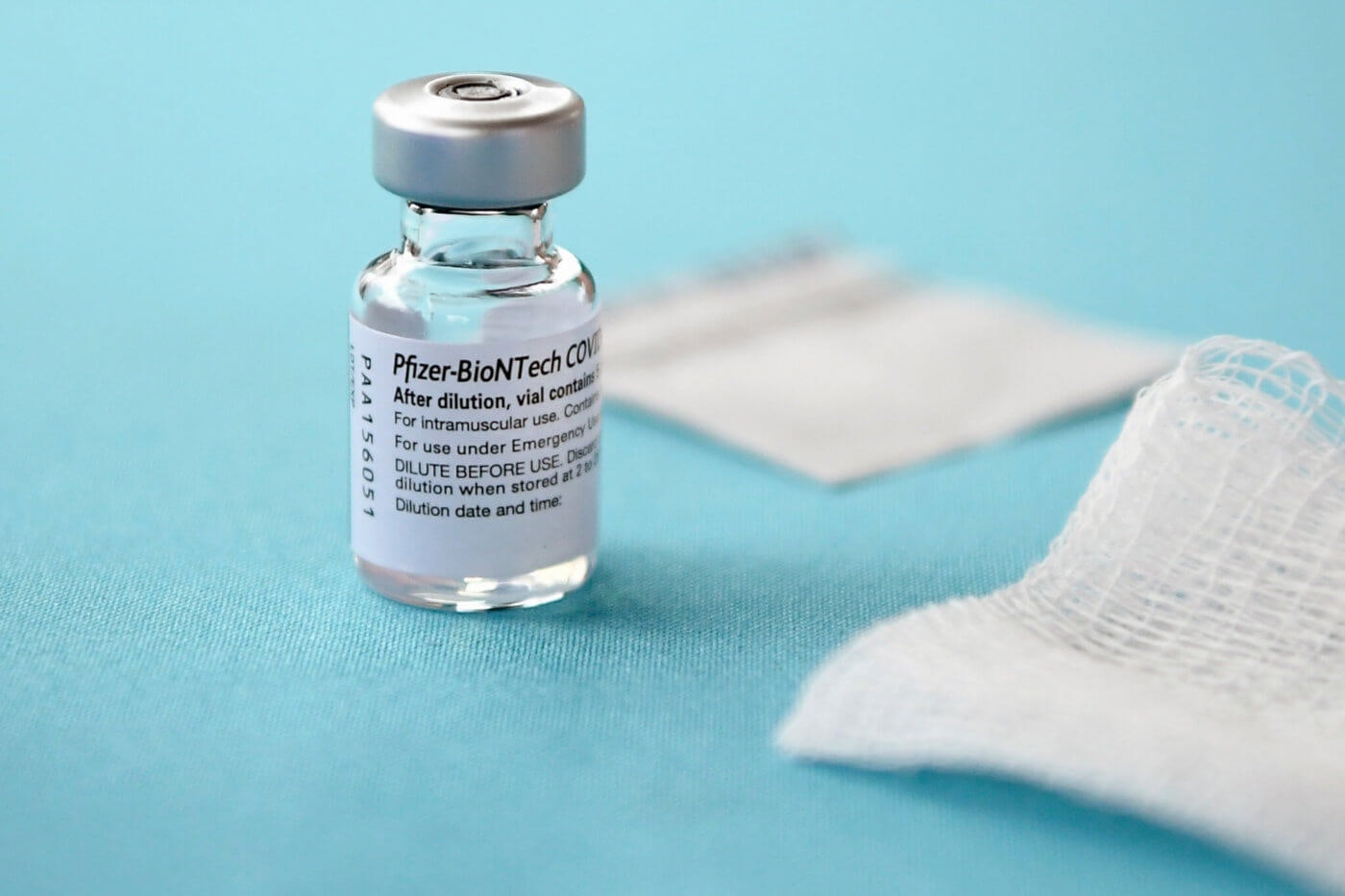 A vial of the Pfizer-BioNTech vaccine for COVID-19 sits on a table. (AP Photo/Jessica Hill)
