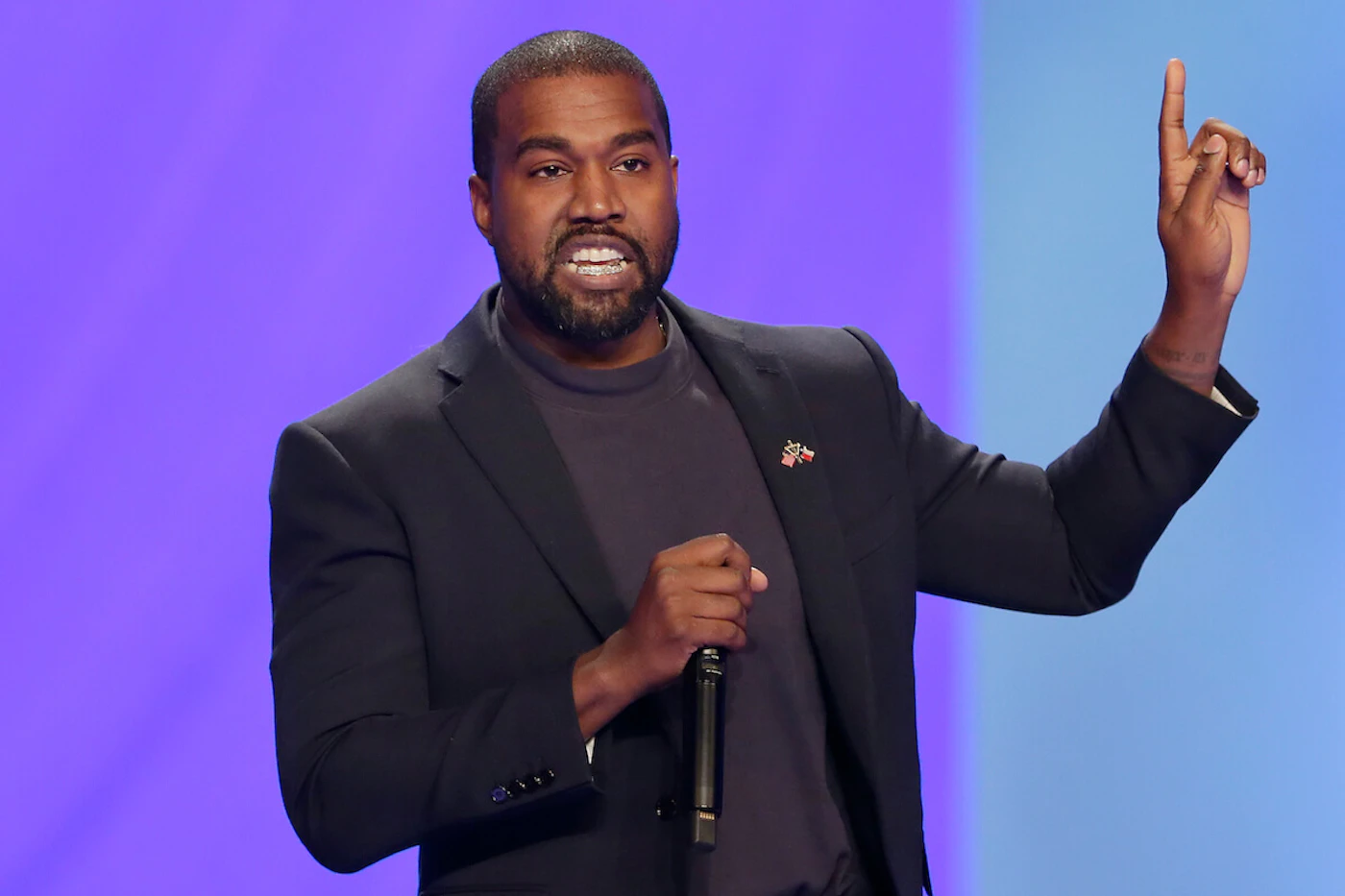 FILE - Kanye West answers questions during a church service, Nov. 17, 2019, in Houston, TX.