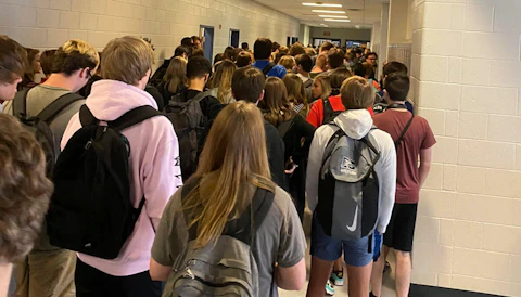 Crowded school hallway.