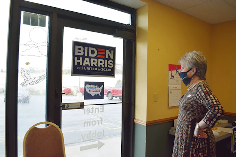 Deb Dassow, chairwoman of the Ozaukee County Democratic Party, gives a tour of the party's first-ever field office several days before Election Day in downtown Grafton. (Photo by Jonathon Sadowski)