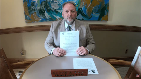 Rep. Timothy Ramthun (R-Campbellsport) holds up his resolution to decertify Wisconsin's 2020 election in a video posted to his YouTube channel. There is no mechanism in Wisconsin law to decertify an election. (Screenshot via YouTube)