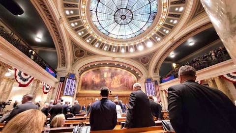 Wisconsin lawmakers wait for Gov. Tony Evers' 2022 State of the State address in the Assembly chamber at the state Capitol in Madison. (Photo by Jonathon Sadowski)