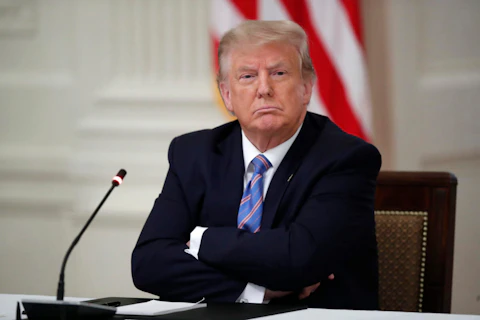 President Donald Trump listens during a "National Dialogue on Safely Reopening America's Schools," event in the East Room of the White House, Tuesday, July 7, 2020, in Washington. (AP Photo/Alex Brandon)