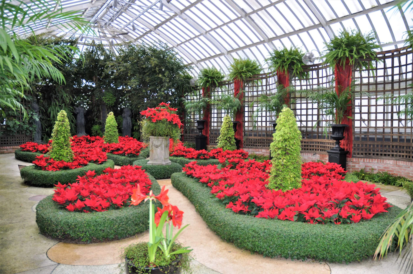 A visit to the Winter Flower Show at Phipps Conservatory will include beautiful sights and a floating carousel on a pond. (Shutterstock Photo/StacieStauffSmith Photos)