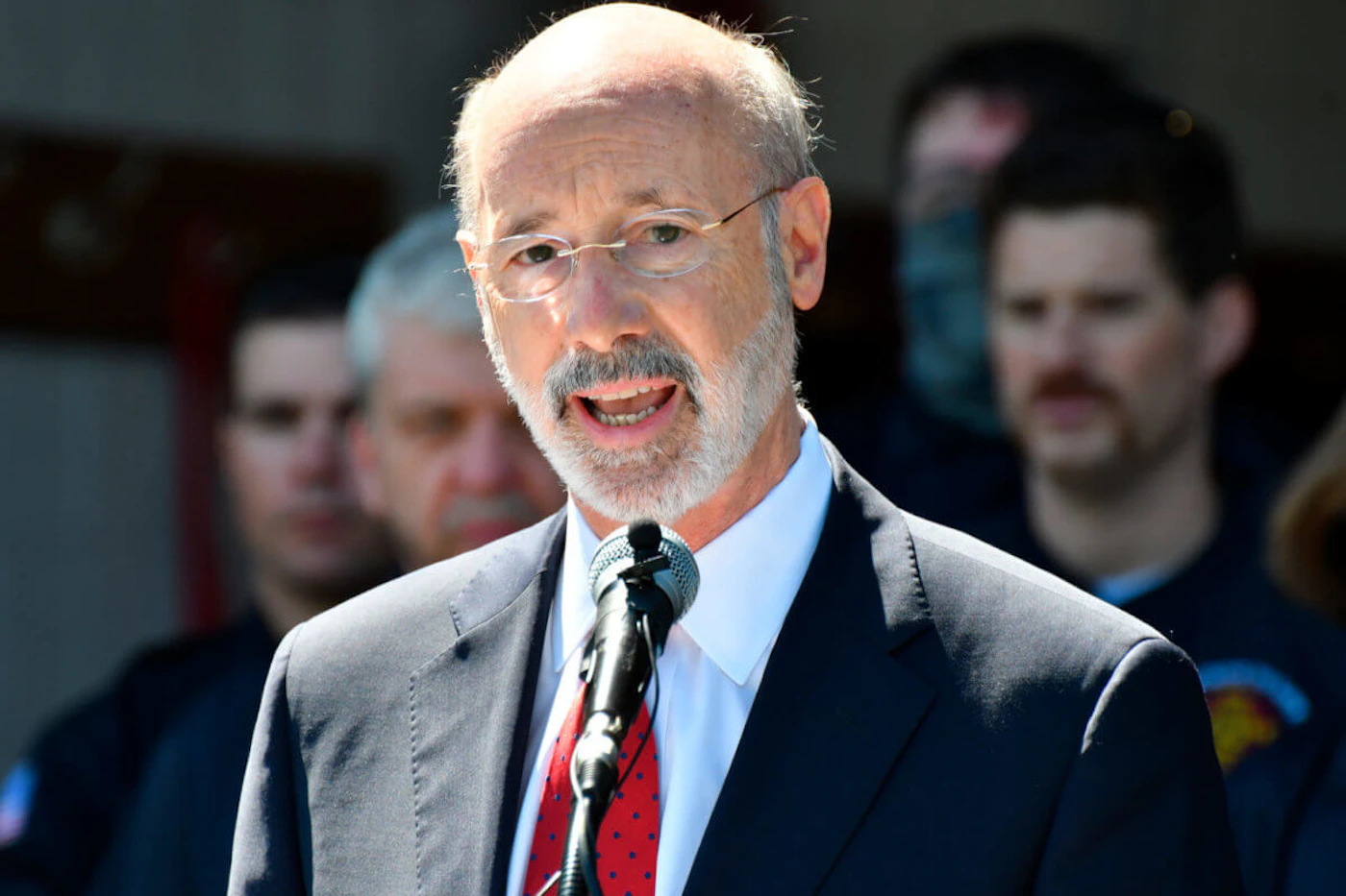 Gov. Tom Wolf speaks at an event in Mechanicsburg, Pa.  Beyond the local races on ballots, Pennsylvania’s primary election will determine the future of a governor’s authority during disaster declarations. Voters statewide Tuesday, May 18 will decide four separate ballot questions, including two on whether to give state lawmakers much more power over disaster declarations. (AP Photo/Marc Levy)