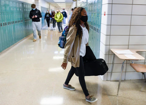 Giani Clarke,18, a senior at Wilson High School in West Lawn walks to her next class on March 3, 2021. (Photo by Ben Hasty/MediaNews Group/Reading Eagle via Getty Images)