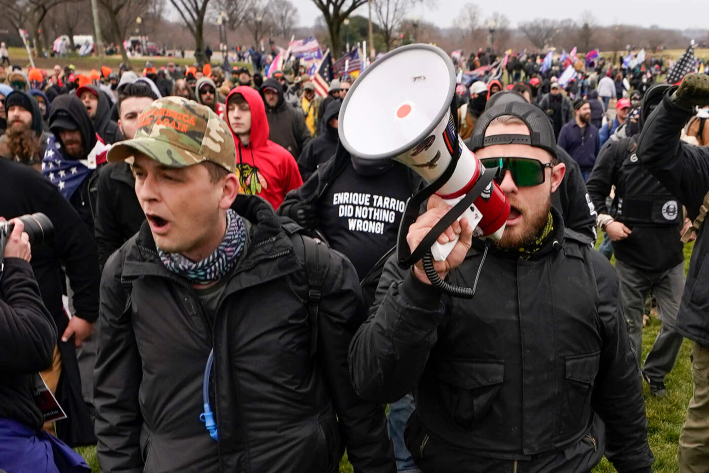 FILE - Proud Boys members Zachary Rehl, left, and Ethan Nordean, left, walk toward the U.S. Capitol in Washington, in support of President Donald Trump on Jan. 6, 2021. (AP Photo/Carolyn Kaster, File)