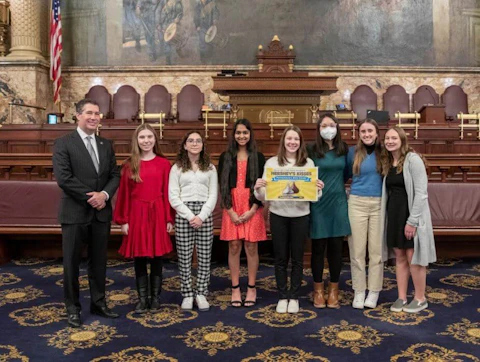 State Rep. Tom Mehaffie (L) with members of the Hershey Kiss Committee at the Pennsylvania Capitol in Harrisburg on April 6, 2022. (Photo courtesy of Hershey Kiss Committee)