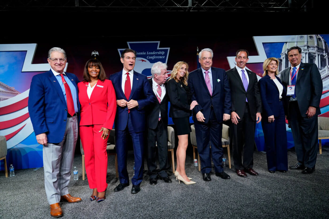 FILE—In this file photo from April 2, 2022, George Bochetto, Kathy Barnette, Mehmet Oz, Jeffrey Lord, Rose Tennent, John Gizzie, Jeff Bartos, Carla Sands, and Lowman Henry pose for a photograph during a forum for Republican candidates for U.S. Senate in Pennsylvania at the Pennsylvania Leadership Conference in Camp Hill, Pa. Republicans have made anger over the 2020 election a staple of this year's mid-term primary campaigns as Democrats appear prepared to tie them to the Jan. 6 insurrection at the U.S. Capitol, contending that Republican-sponsored election legislation is an attack on voting rights. Pennsylvania's primary election is May 17. (AP Photo/Matt Rourke, File)