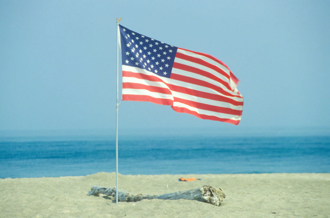 American Flag on the Beach of Lake Erie, Pennsylvania (Photo by: Joe Sohm/Visions of America/Universal Images Group via Getty Images)